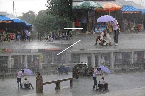 19. Evsiz ve yürüyecek hali olmayan bu adamı, sağanak yağmurdan koruyan bu kadın.