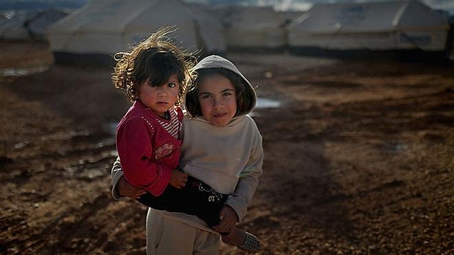 Çocuk ve Savaş Kelimesinin Yan Yana Bile Gelmemesi Gerektiğini Gösteren 30 Fotoğraf