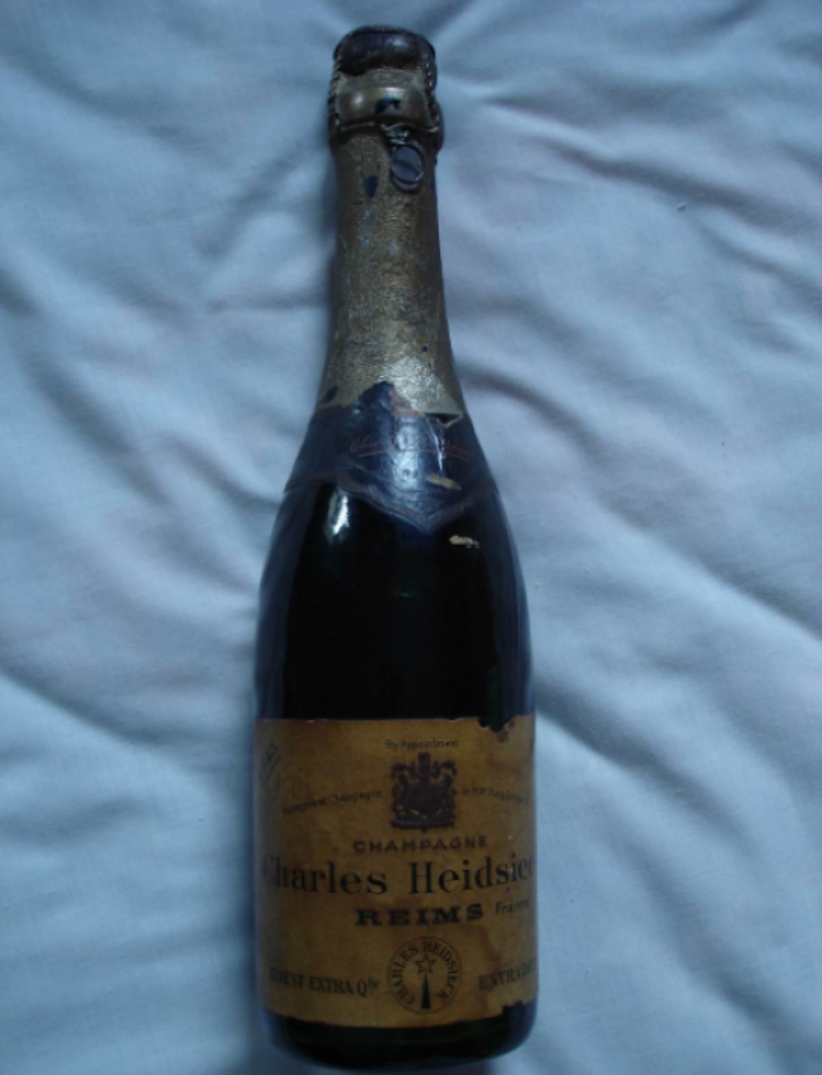 Шампанское 1907 Heidsieck. Шампанское: Heidsieck Monopole 1907. Shipwrecked 1907 Heidsieck & co Monopole Champagne. Шампанское Shipwrecked 1907 Heidsieck самое дорогое в мире.