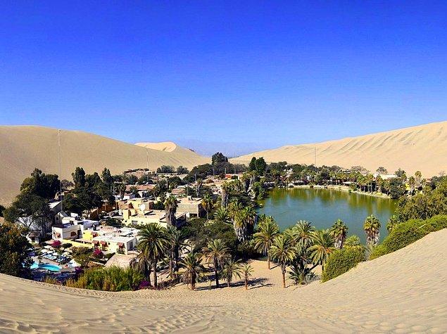 20. Huacachina is a real oasis in the middle of the Peruvian desert! This is a resort town built around the natural lake in the Southwestern Ica Region. You can try "sandboarding" here!