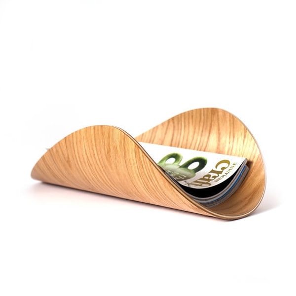 11. Оригинальная подставка для журналов и газет: