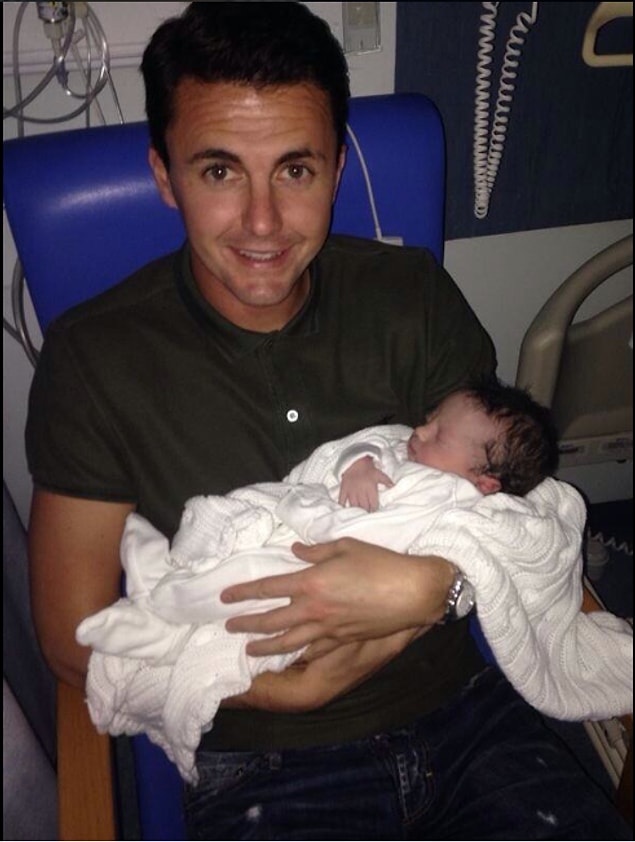 8. Holding a baby