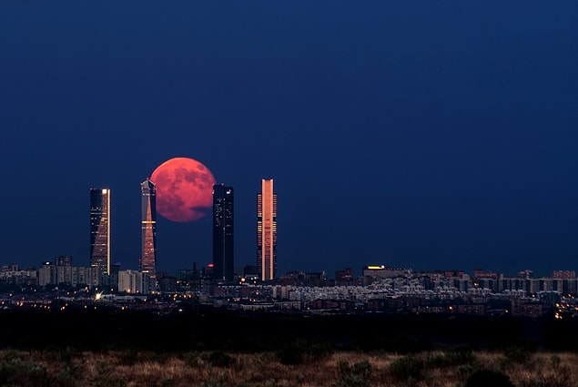 11. The blood-moon dancing between the towers of Madrid