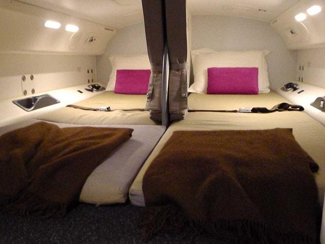 Much more luxurious and for two people. Two beds along with two business class seats. Some planes even have a sink and a toilet for them.