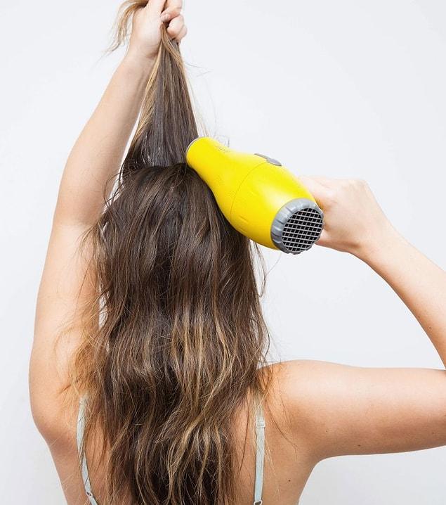 2. Use your fingers instead of a hair brush while blowdrying it.