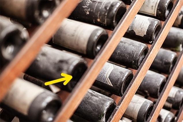 12. The indentations under wine bottoms are created for several different purposes.