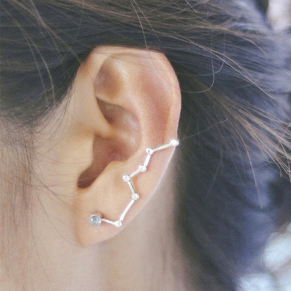 10. И еще одно созвездие, разместившееся на мочке уха