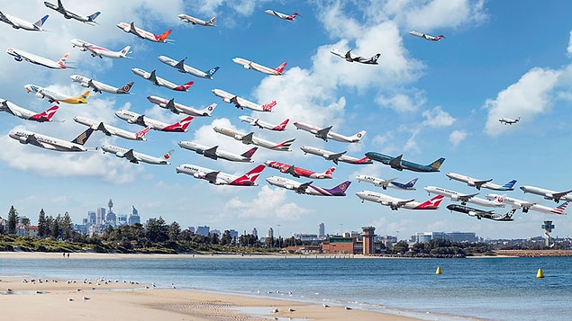 13. Sydney Kingsford Smith Havalanı 34L numaralı pist. Botany Körfezi üzerinden kalkan uçaklar.