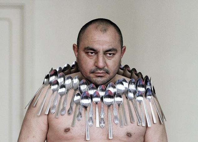 4. The Guinness World Record for most spoons on a human body.