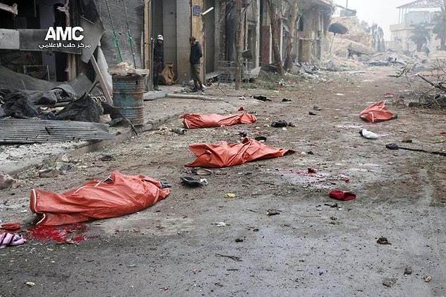 5. Bodies lie on the ground in bags after a bombing in the rebel-held Jibb al-Quebeh neighborhood of Aleppo on Nov. 30.