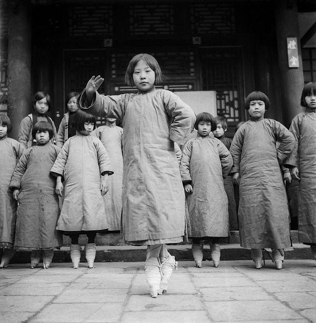 14. Sing-song girls (tea-house entertainers who sing and dance) in training, China 1932.