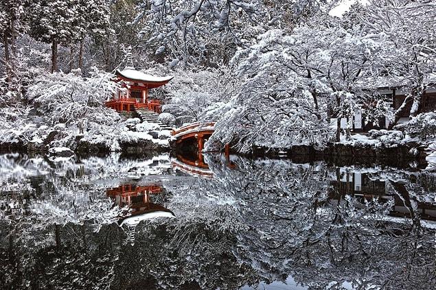 7. A temple in Kyoto, Japan, hidden by snow.