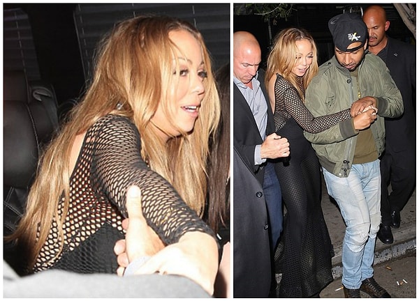 8. Мэрайя Кери успешно пользуется помощью крепкой мужской руки