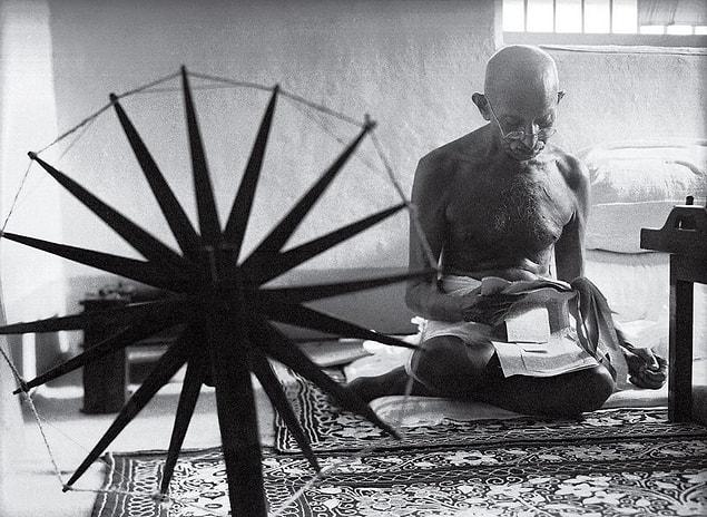28. Gandhi And The Spinning Wheel, Margaret Bourke-White, 1946