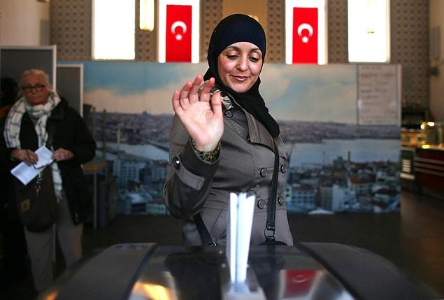 14. A woman votes in the Netherlands general elections at an Amsterdam mosque on March 15.