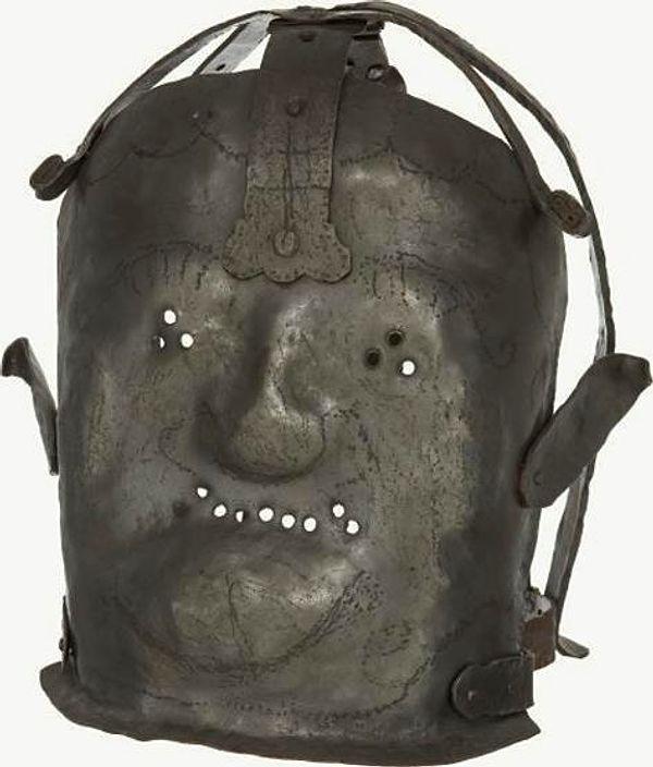 25. 17th-Century Insanity Mask.