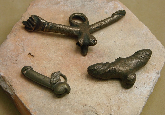 9. Ancient Romans loved to decorate with a good luck charm called a ''fascinus.''