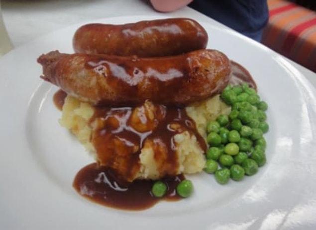 2. Bangers and mash covered in gravy.