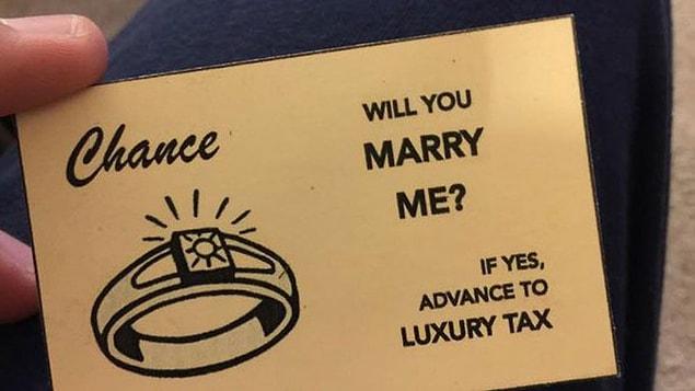 Justin popped the question with a “Will You Marry Me?” Chance card.