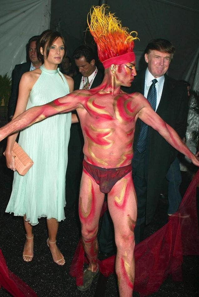 9. Trump being rudely interrupted by a half-naked Cirque du Soleil performer in 2003.