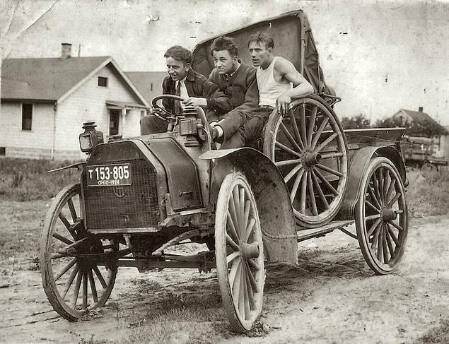 3. Three young men in a vehicle, c. 1924