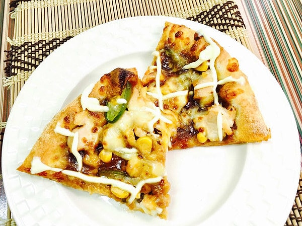 4. Кукуруза - типичная начинка пиццы