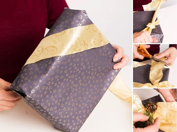 6. Чтобы украсить обертку, пропускаем ленту по углам коробки, а затем завязываем бантик спереди. В середину бантика можно также добавить шишку, закрепив ее с помощью клеевого пистолета. Готово!