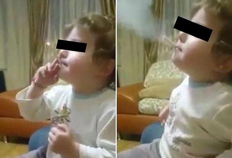 2 Yaşındaki Çocukları Sigara İçerken Kahkaha Atıp Kameraya Çeken Aile Tutuklandı