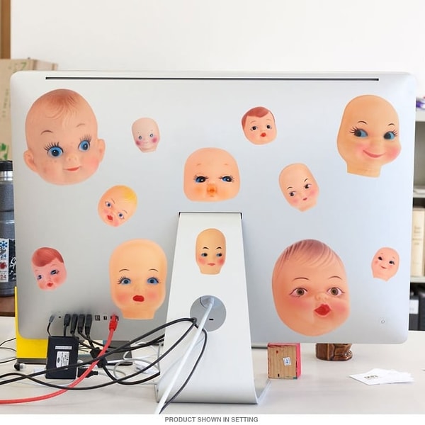 5. Наклейки на ноутбук в виде голов младенцев