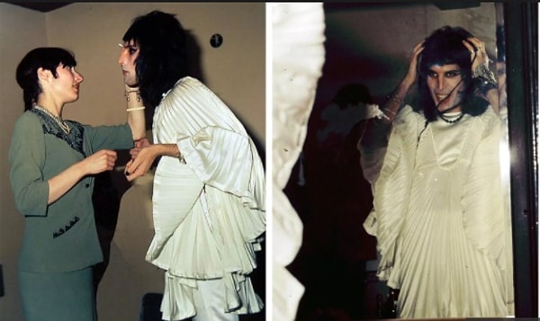 3. Фредди в своей раздевалке с визажистом перед тем, как отправиться на сцену своего лондонского концерта в 1974 году.