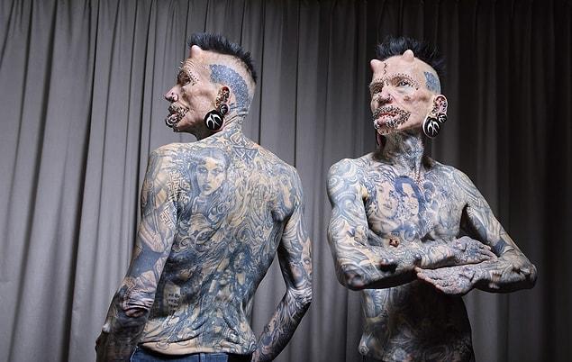 8. Most body modifications for a male — 516