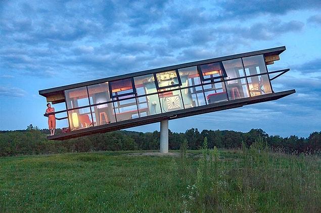 The project, called ReActor, is a 42 by 8-foot rotating home that balances on a single 14-foot tall concrete column.