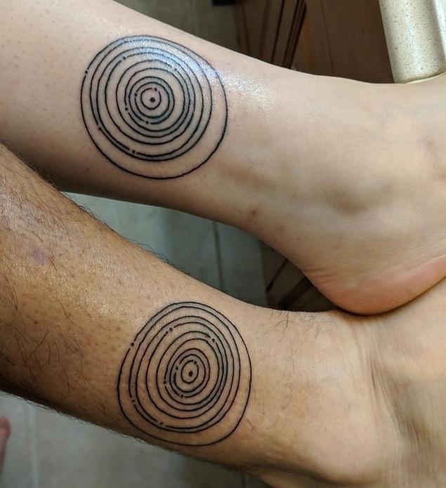 11. "My wife and I got matching tattoos of a diagram depicting the position of the planets on our wedding day."