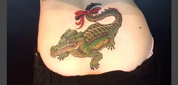 23. Ничего особенного. Просто милый такой крокодил с бантиком