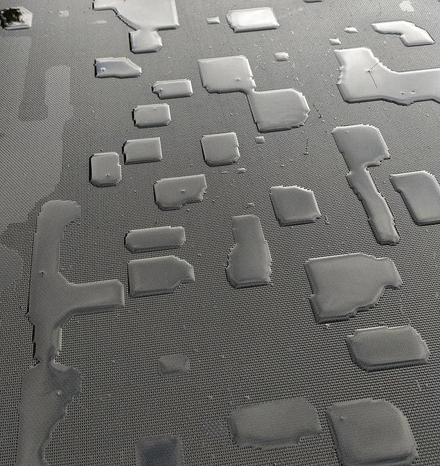 8. “Square water patterns on my trampoline this morning”