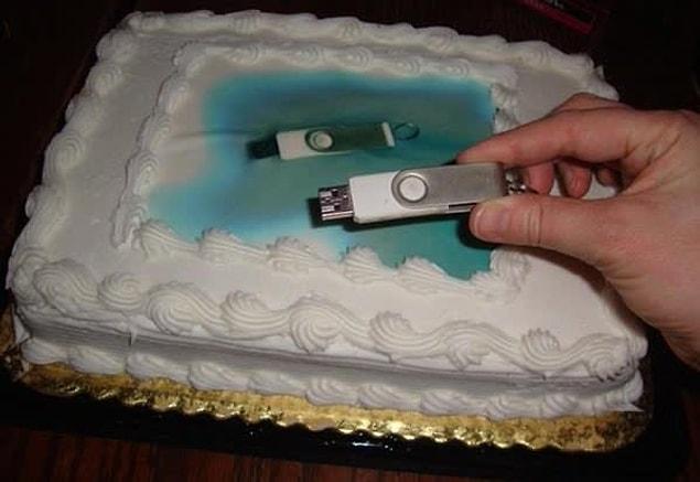 14. The cake decorator who was supposed to "use the memory stick" for the pic: