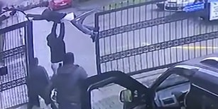 Üzerinden Atlamaya Çalıştığı Otomatik Kapı Açılınca Asılı Kalan Genç
