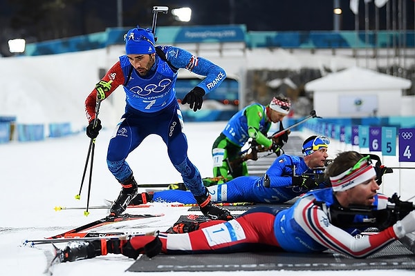 12. Если биатлонист стреляет не по своей мишени, то...