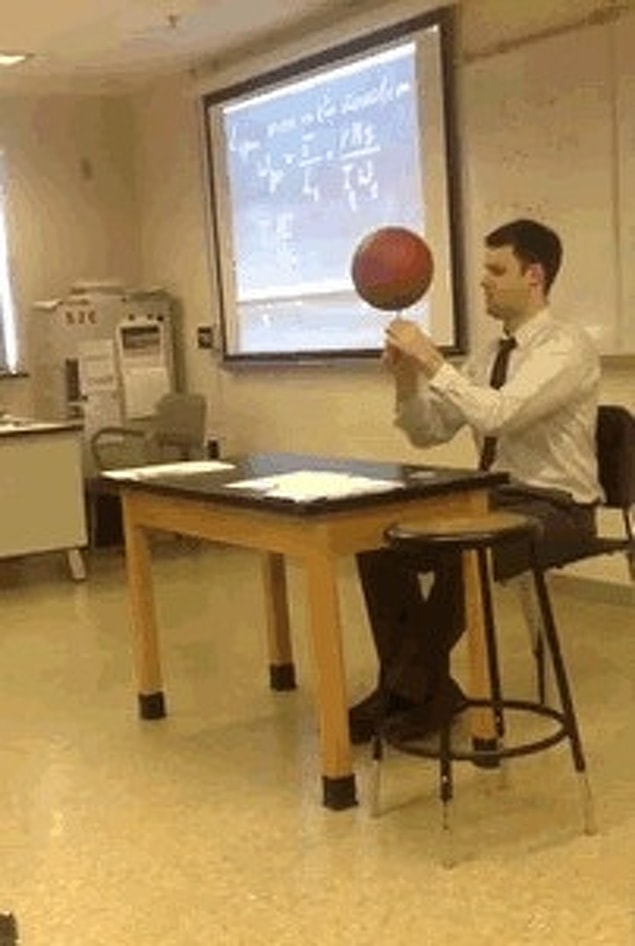 10. "This awesome teacher grades tests while spinning a basketball on a pen."