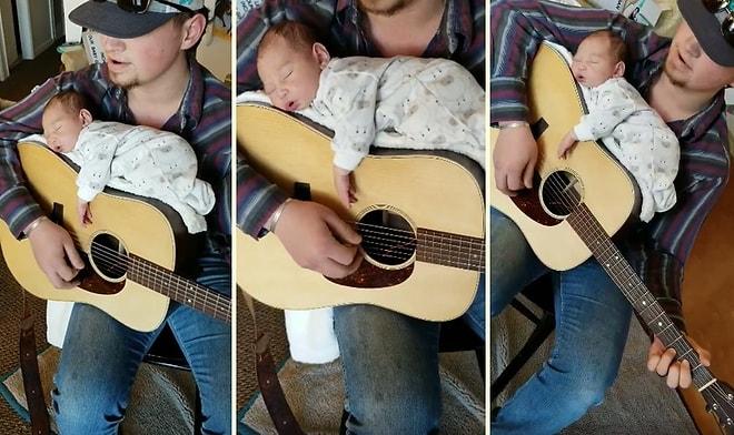 Bebeğini Gitarın Üzerinde, Şarkı Söyleyerek Uyutan Babadan Gözlerden Kalpler Fışkırtacak Güzellikte Video!