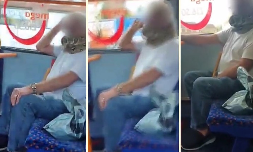 Yüzüne Maske Takmak Yerine Ağzını Burnunu Yılanla Kapatan Adam