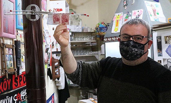 Paraları Dezenfektanla Yıkayıp, Sobada Kurutuyor