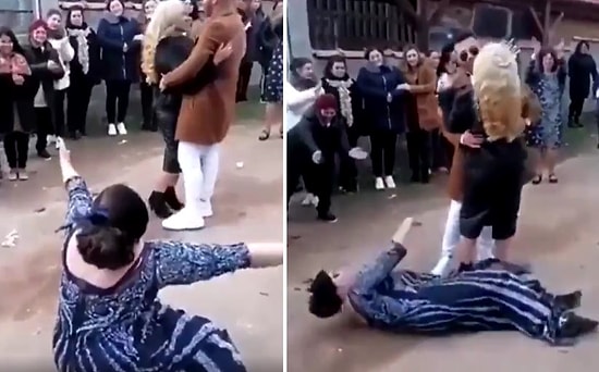 Onlarca İnsanın Arasında Dans Eden Çift ve Onlara Yerde Yuvarlanarak Eşlik Eden Kadının Bi' Acayip Görüntüleri