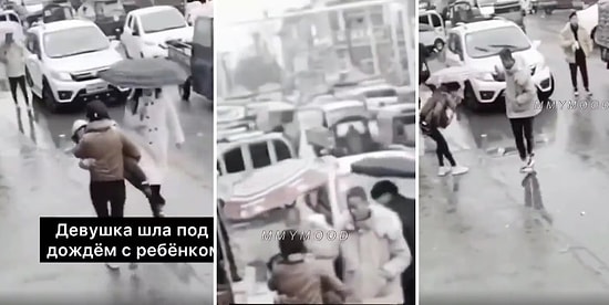 Yağmurlu Havada Kucağında Çocuğunu Taşıyan Anneye Şemsiyesini Veren Güzel Yürekli İnsan