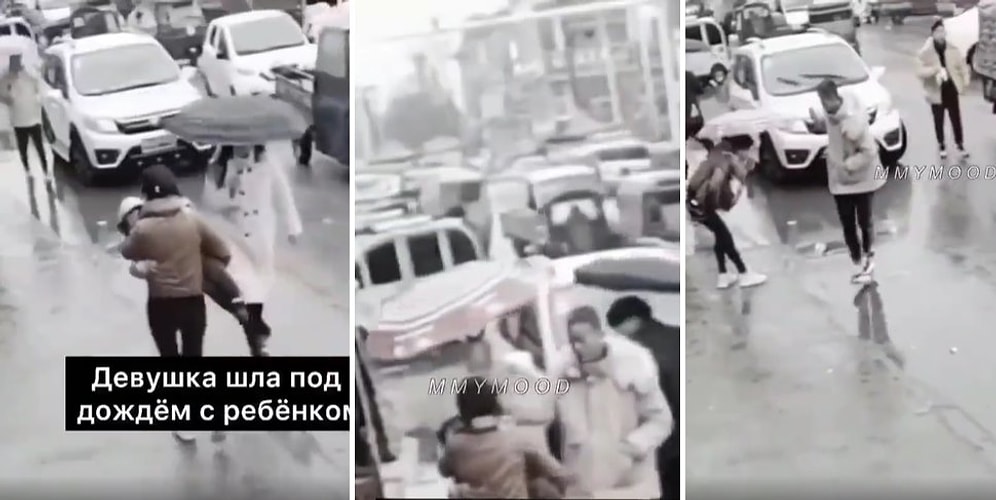 Yağmurlu Havada Kucağında Çocuğunu Taşıyan Anneye Şemsiyesini Veren Güzel Yürekli İnsan