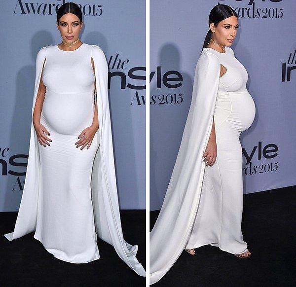 6. Bodycon elbiseler içerisinde görmeye alışkın olduğumuz Kim Kardashian, hamile olduğu zamanlarda da elbise seçimlerini değiştirmemişti.