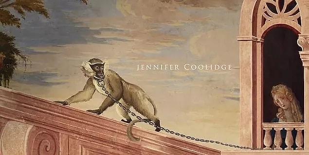 15. Jennifer Coolidge's name is reflected on the screen with the image of a woman in a tower. She has a monkey with her, which she ties with a chain leash.