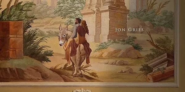 19. The name of the actor playing Greg is shown next to a couple who appear to be riding a donkey.
