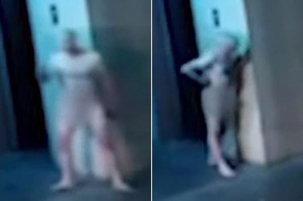 Kimliği tespit edilemeyen adam çıplak bir şekilde yere tuvaletini yapmadan önce Avustralya şehir merkezinde dolaştı.