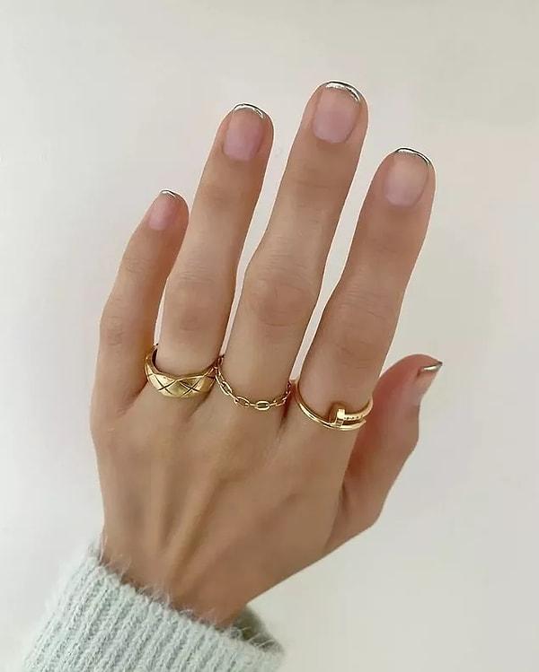 17. If you are tired of the classic French manicure, take a look at this. You will have achieved a simple and stylish look on your thin, chrome-tipped French nails.